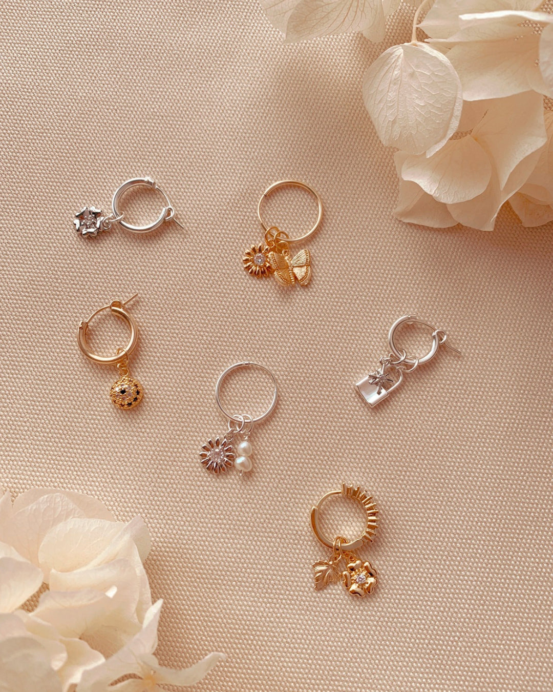 Sterling silver Fleur flower blossom earring charm for huggie hoops earrings. Made in Australia.