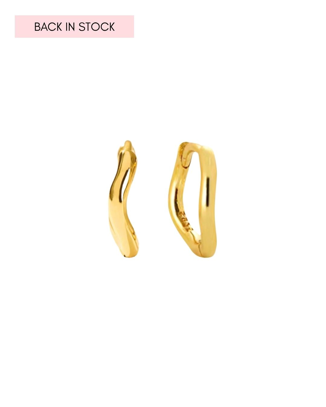 Gold sculptural huggie earrings with organic curved design