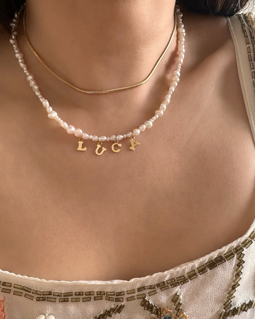 Gold-filled Classic Pearl Initial Choker with organic freshwater pearls and customisable initials, puffy heart or mini pearl charms.