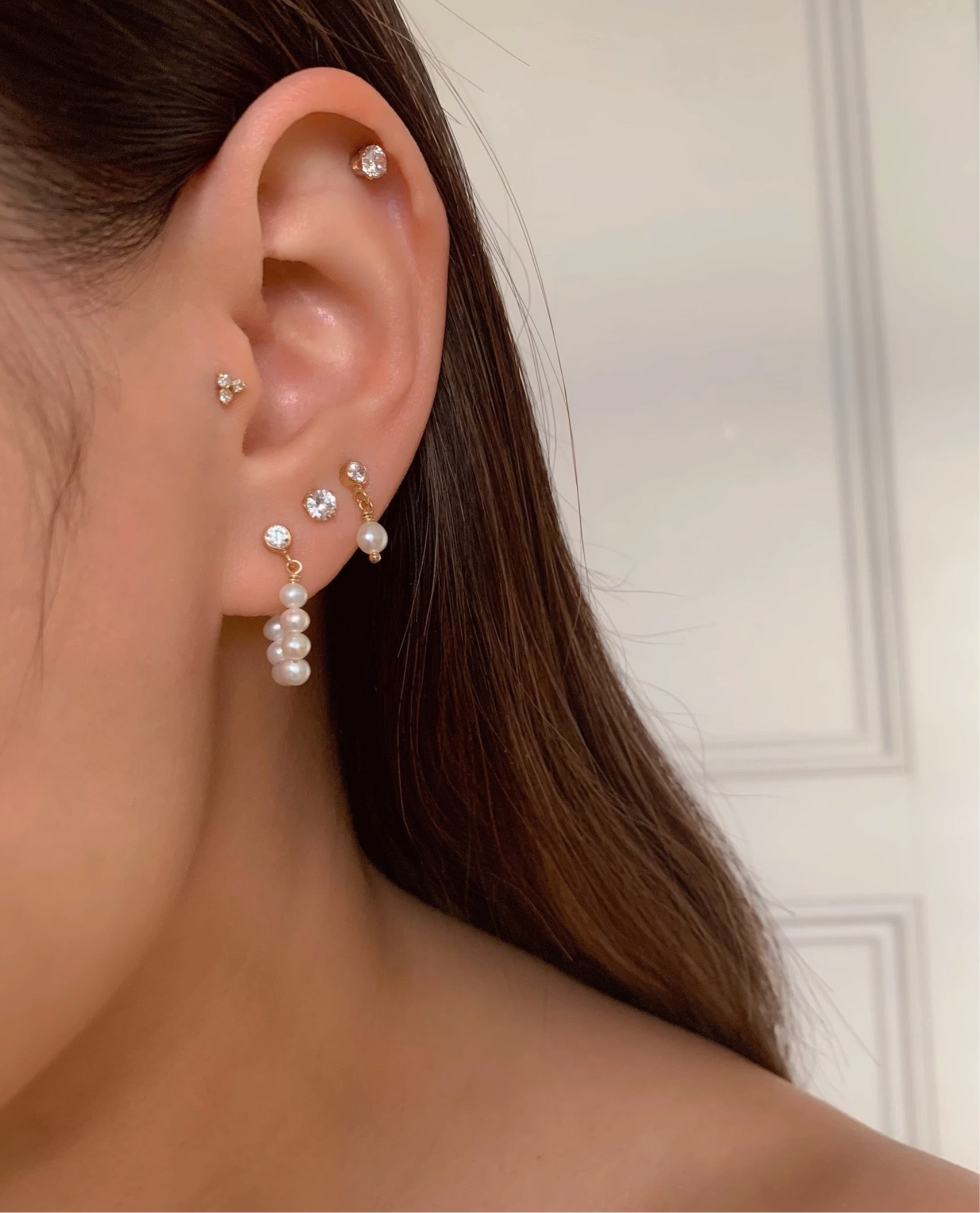 14k gold fill crystal diamond stud earring on a model