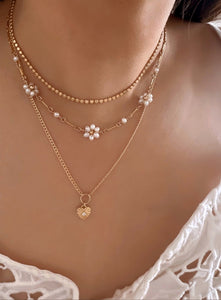 Gold Daisy Pearl Choker Necklace on a model 