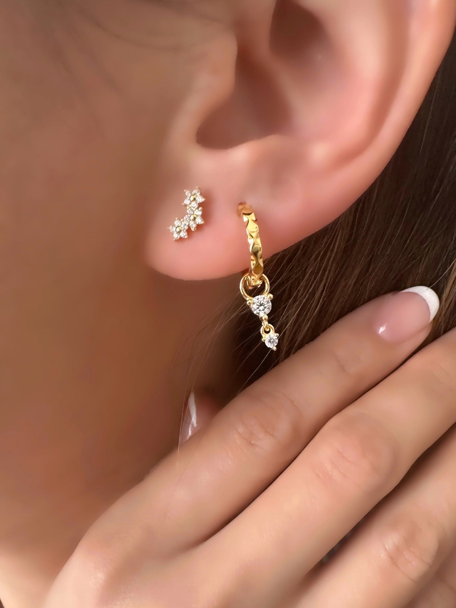 Gold Vermeil Trilia Reversible Flatback Stud with Astra Drop Charm Hoops on a model