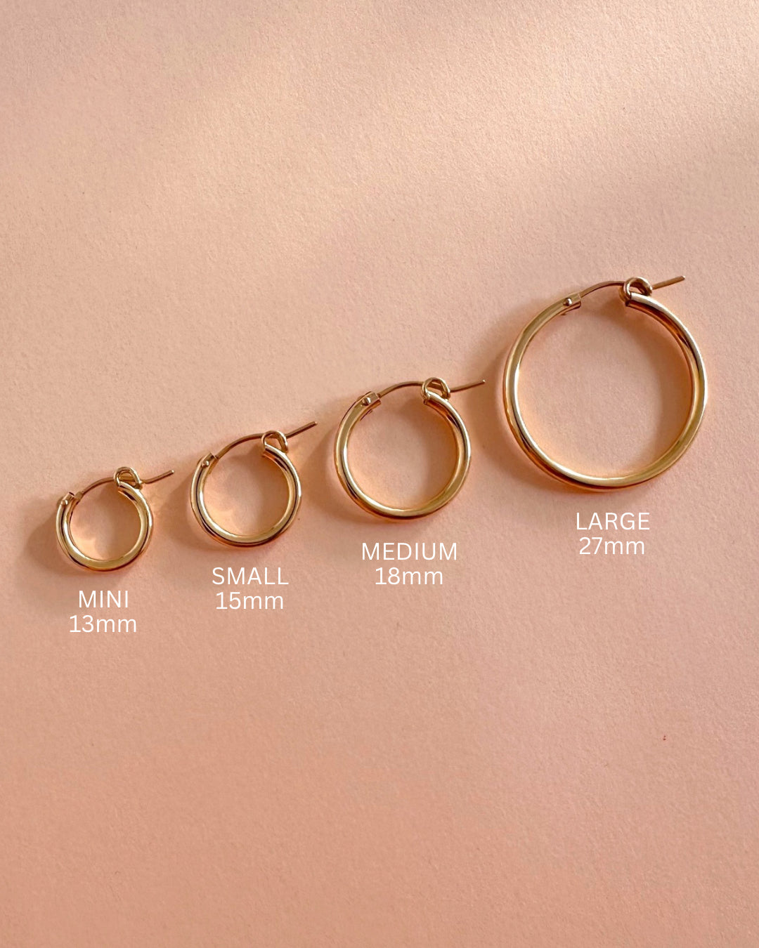 Flatlay of Mini, Small, Medium and Large Euro Hoops size comparison.