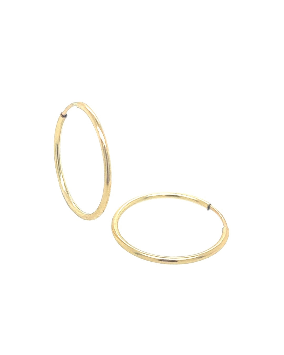 14k yellow gold fill Huggie hoops earrings. Made in Australia. Classic minimal plain gold medium infinity hoops