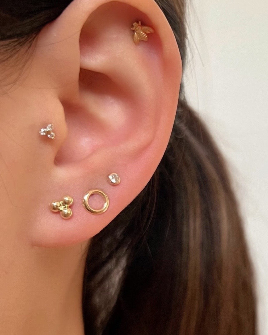 14k yellow solid gold round halo stud earrings with butterfly backings. Made in Australia. Minimal earrings.