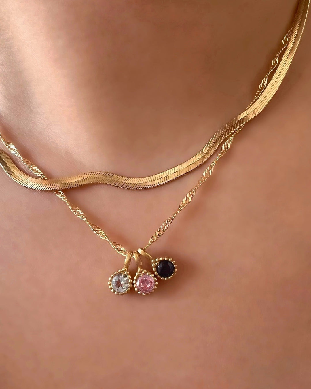 Yellow gold fill singapore chain necklace paired with birthstone pendants and mini serpentine necklace