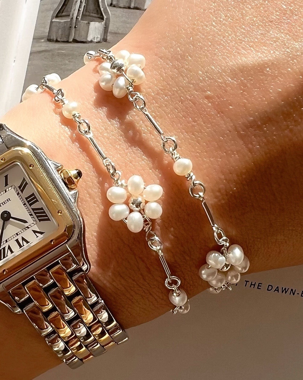 Sterling Silver Daisy Pearl Bracelet on a model