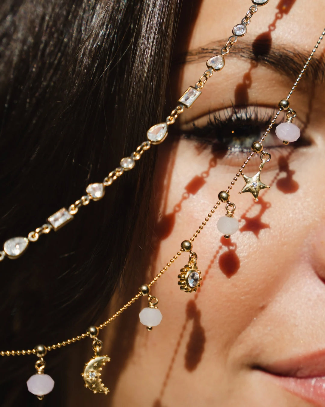 Model wearing 14k gold fill Luna Crescent Moon Charm on a Charm Story Necklace