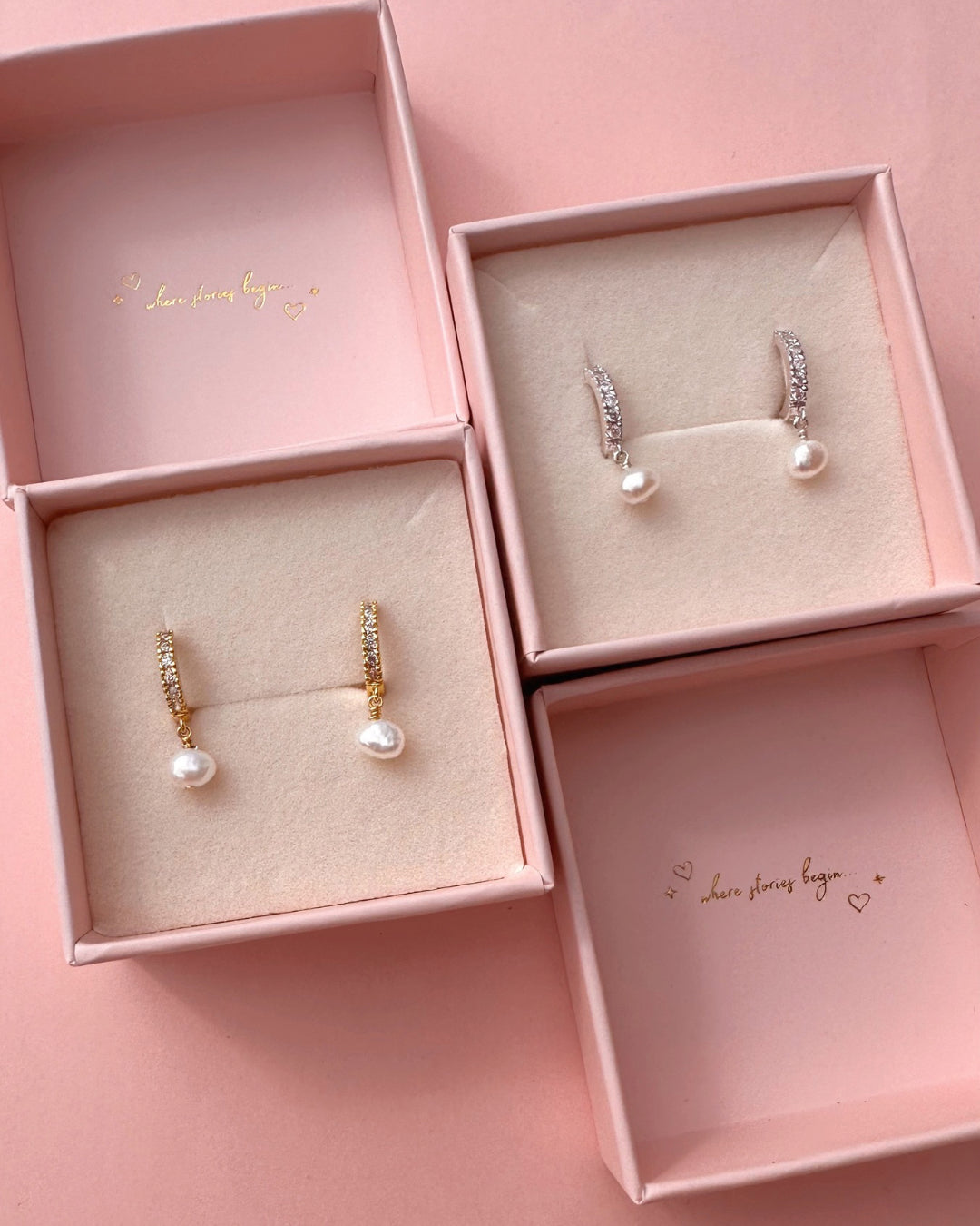 gold pavé huggie hoop earrings with organic freshwater pearl drop – gold vermeil huggies set with cubic zirconia and baroque pearl charm in a Romyli gift box. Also pictured is the Silver Pavé Pearl Huggies