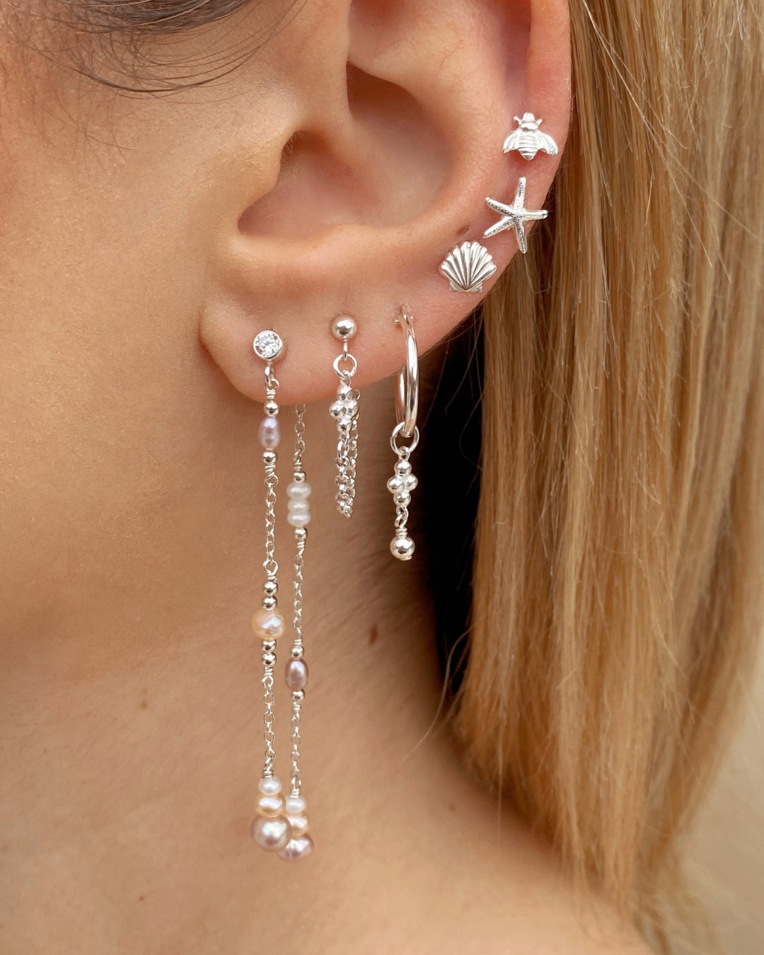 Sterling silver cloudchaser freshwater pearl long stud earrings. Made in Australia