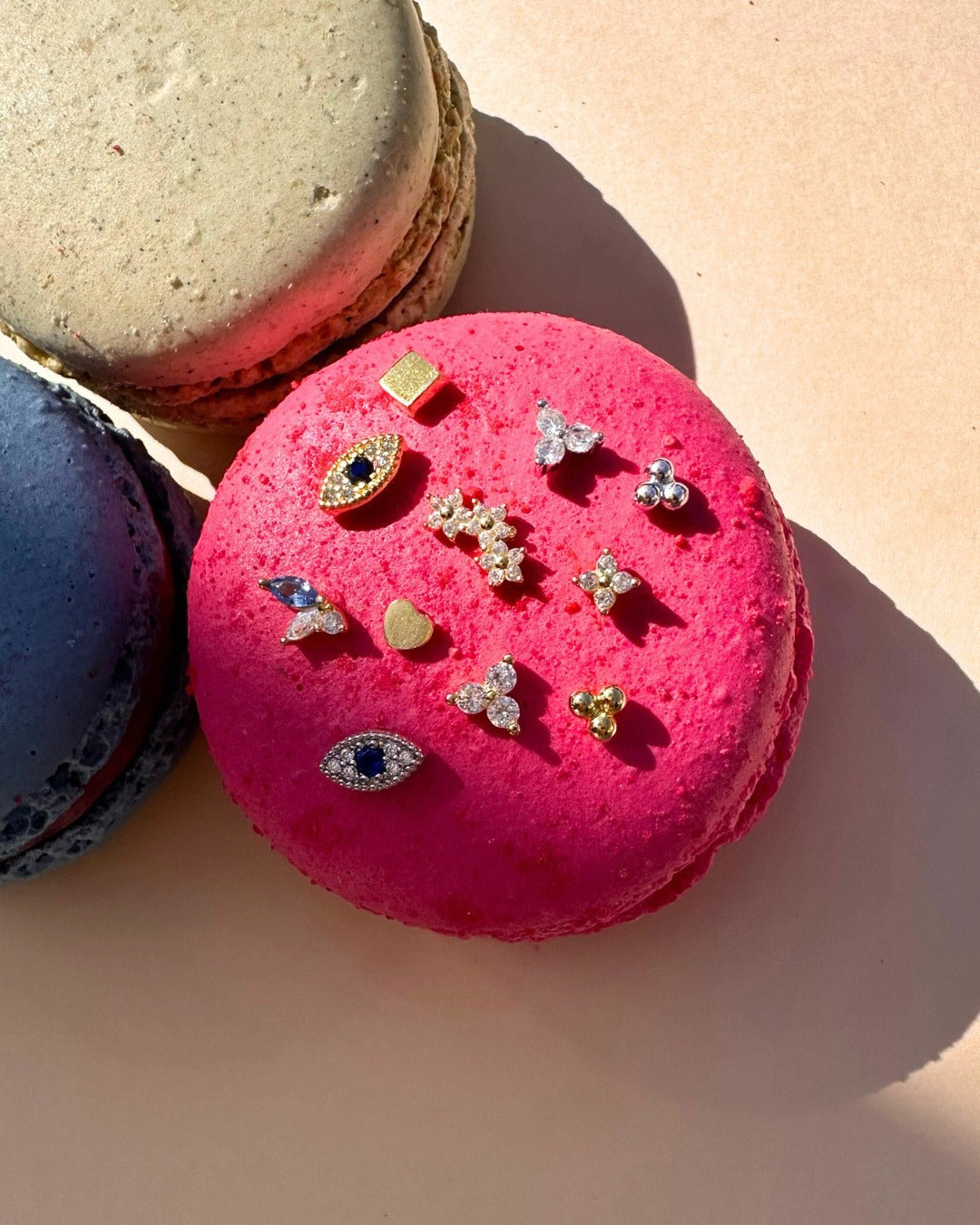 Gold vermeil reversible flatback stud earring with a front dewdrop cluster of sky-blue and white crystals and a polished gold heart back.