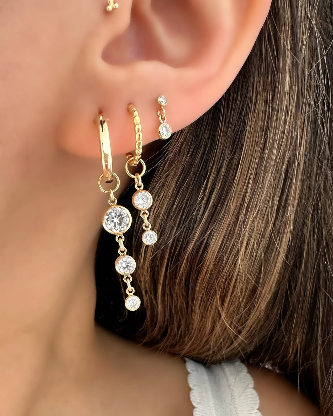 14k yellow gold fill bezel drop earring charm for huggie hoops earrings on a model. Made in Australia.