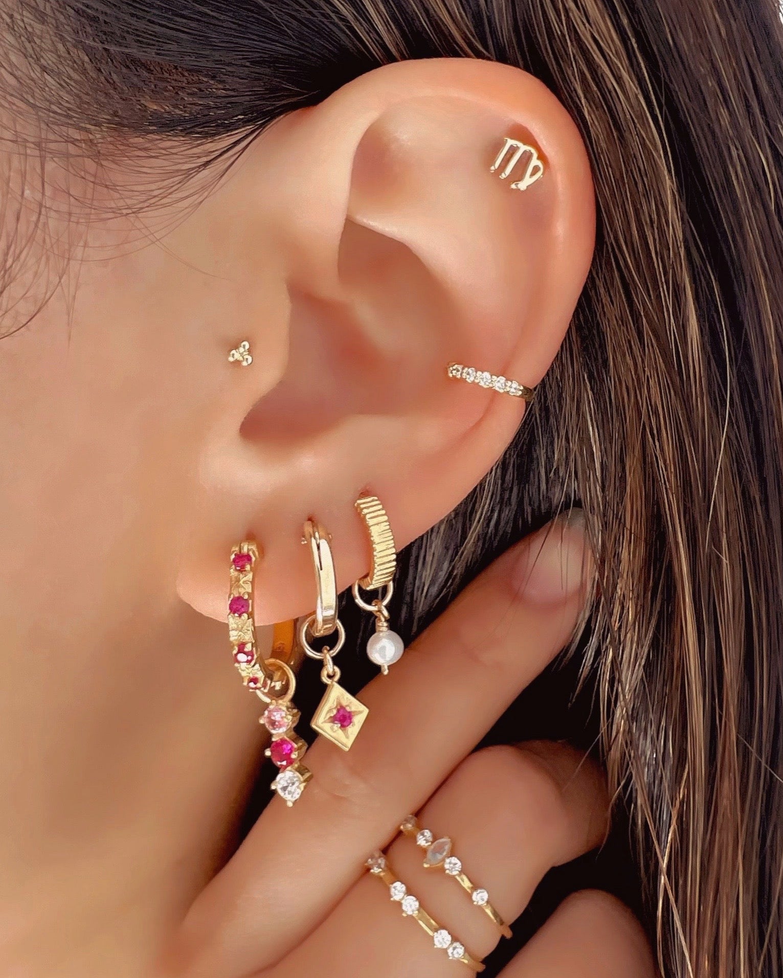 14k gold fill earring charm for hoops in ruby red, pink tourmaline and white diamond cubic zirconia with Asteria Ruby hoops on a model