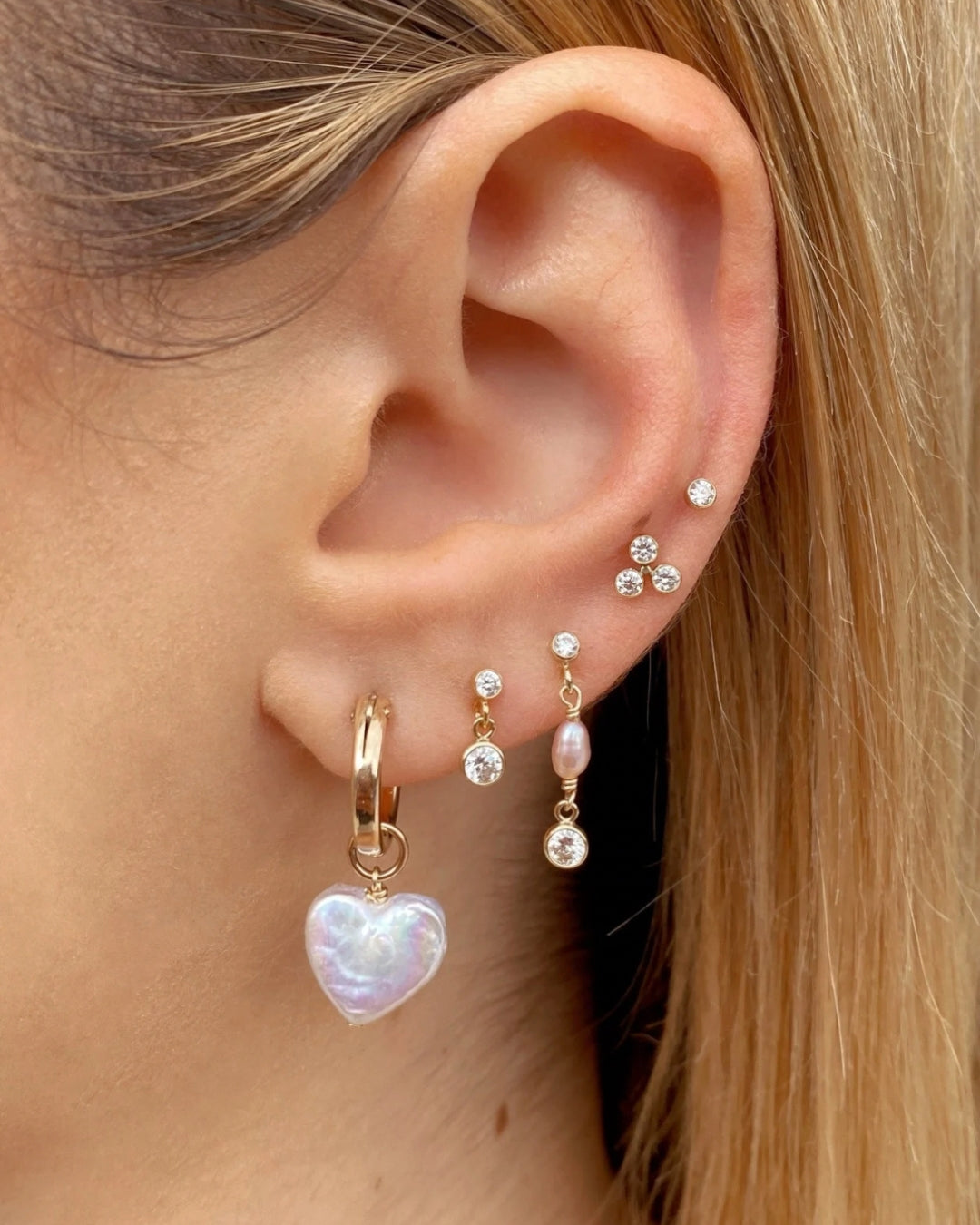 14k gold fill mini bezel drop stud earrings on a model