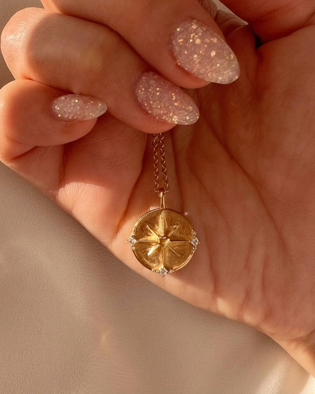 14k gold fill dreamers pendant on a necklace chain featuring a love heart centre on a North Star