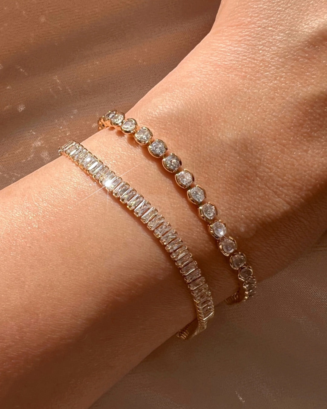 14k yellow gold fill classic crystal baguette tennis white diamond bracelet on a model