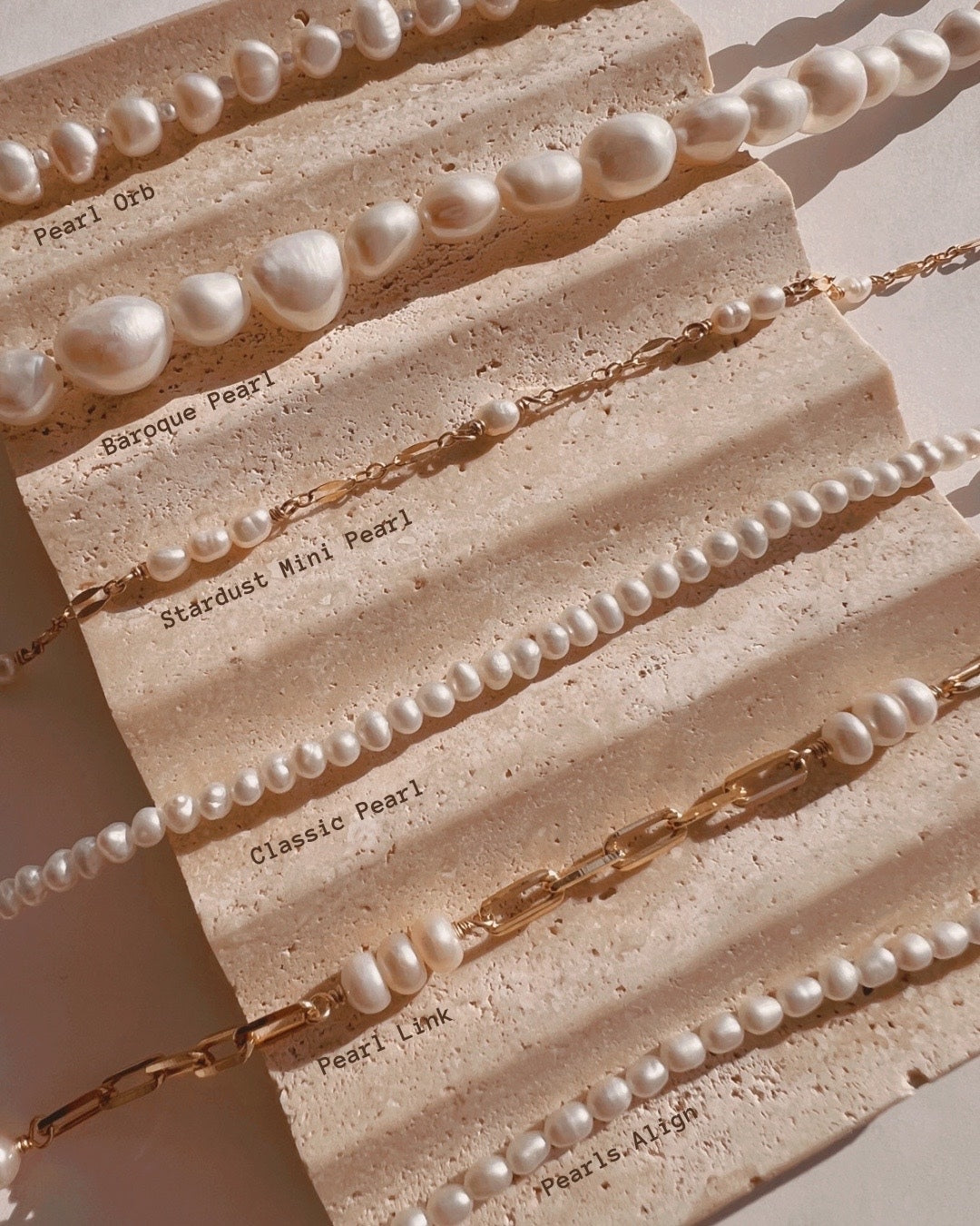 Handcrafted pearl link bracelet with trio of freshwater pearls interspaced on a dainty paperclip chain, designed in Melbourne, Australia. Elegant, timeless pearl bracelet for layering or solo wear.