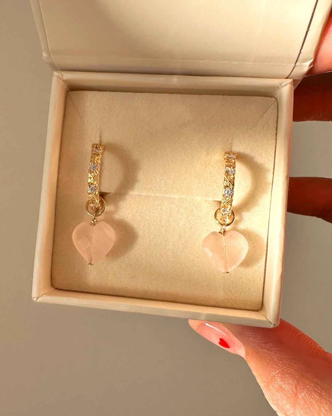 Close-up of a genuine rose quartz heart earring charm in 14k gold fill, approximately 10mm in size, designed to fit all hoops in the Mix and Match Earrings collection. Soft pink gemstone symbolising love, healing, and compassion, associated with January and October and linked to Taurus and Libra.