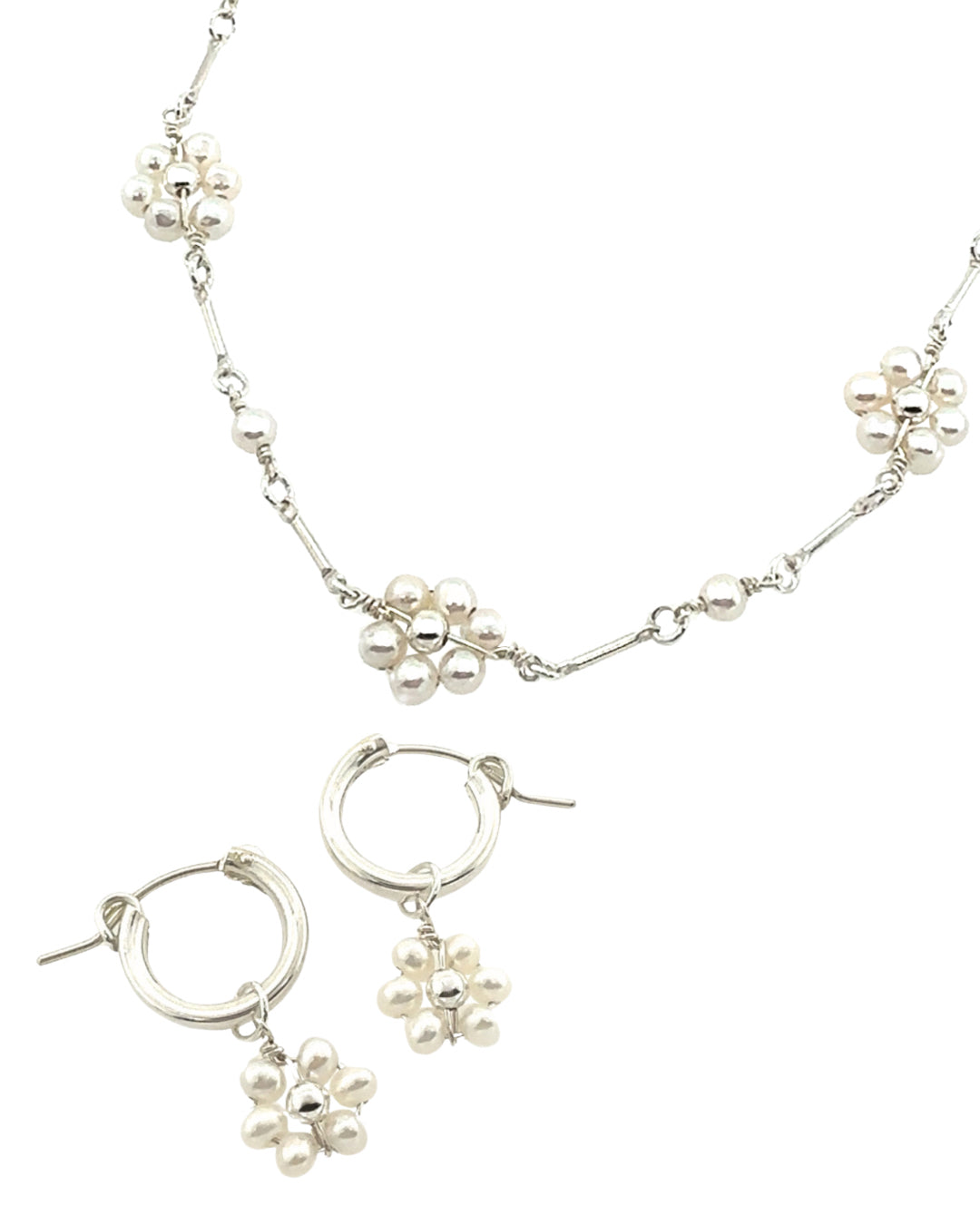 Sterling silver Daisy Pearl necklace and freshwater pearl daisy charm hoops set. Sensitive skin friendly, ethically made in Australia.
