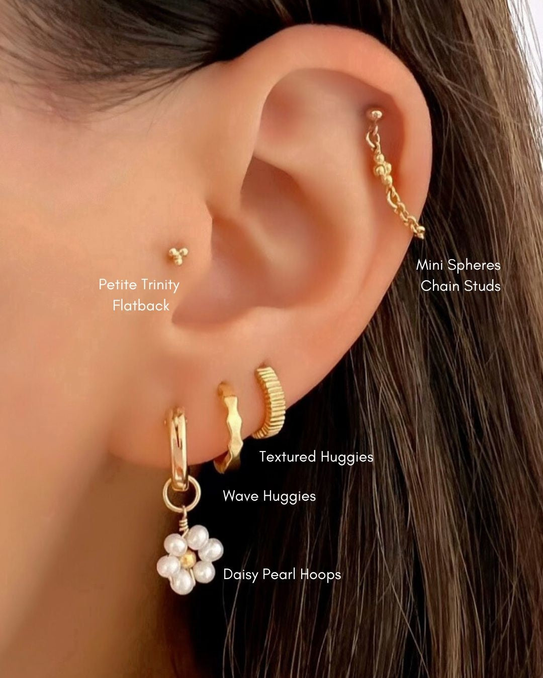 Gold Daisy Pearl Earring Charm Hoops on a model
