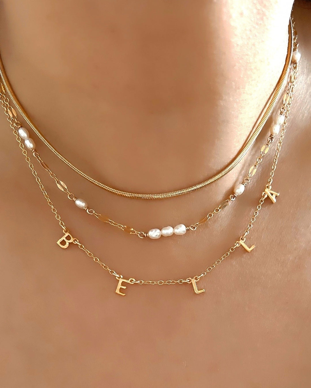 Gold fill herringbone snake chain necklace choker on a model