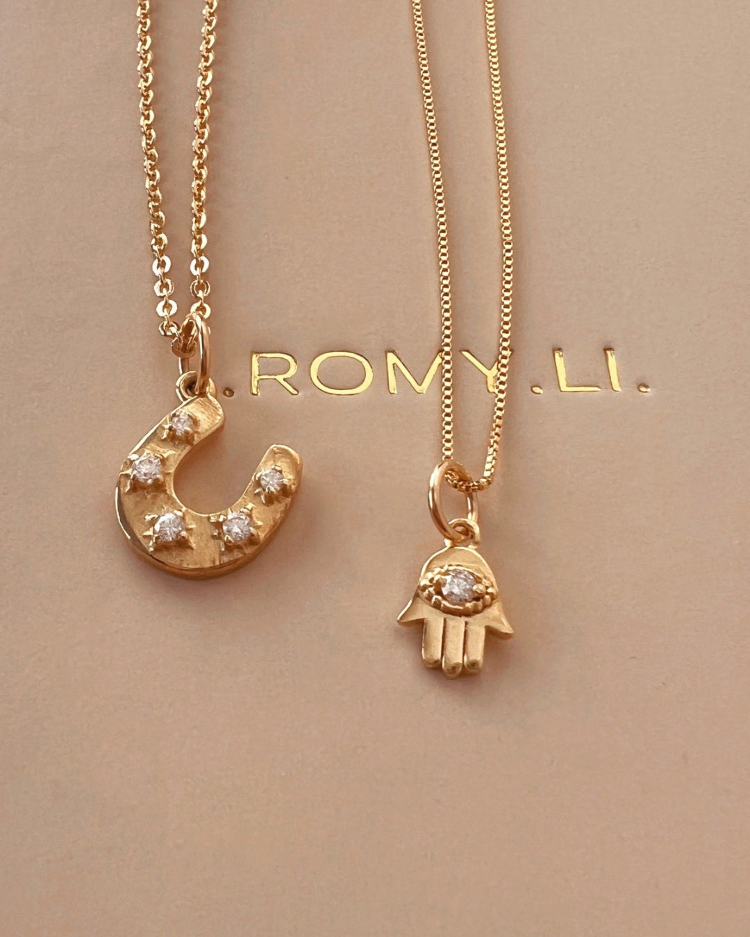 Gold fill hamsa talisman protection pendant on a gold box necklace chain