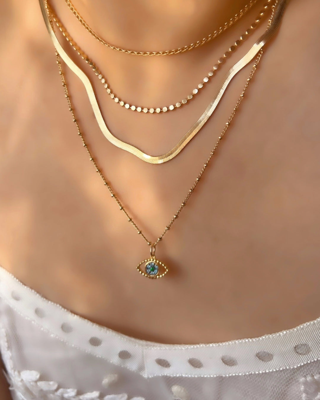 Gold fill evil eye talisman protection necklace chain on a model