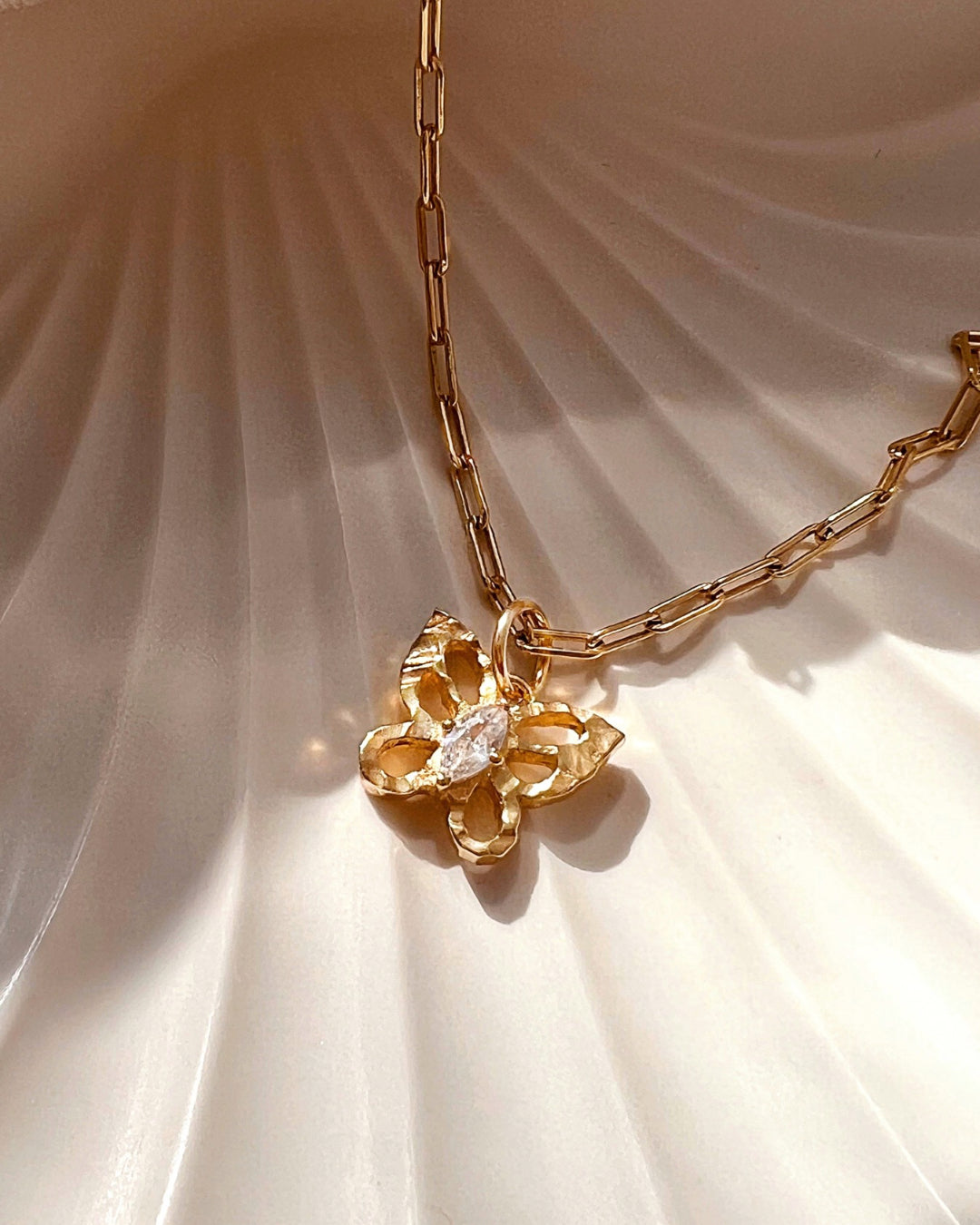 14k gold fill textured butterfly talisman protection pendant on gold paperclip necklace chain with sparkly crystal centre