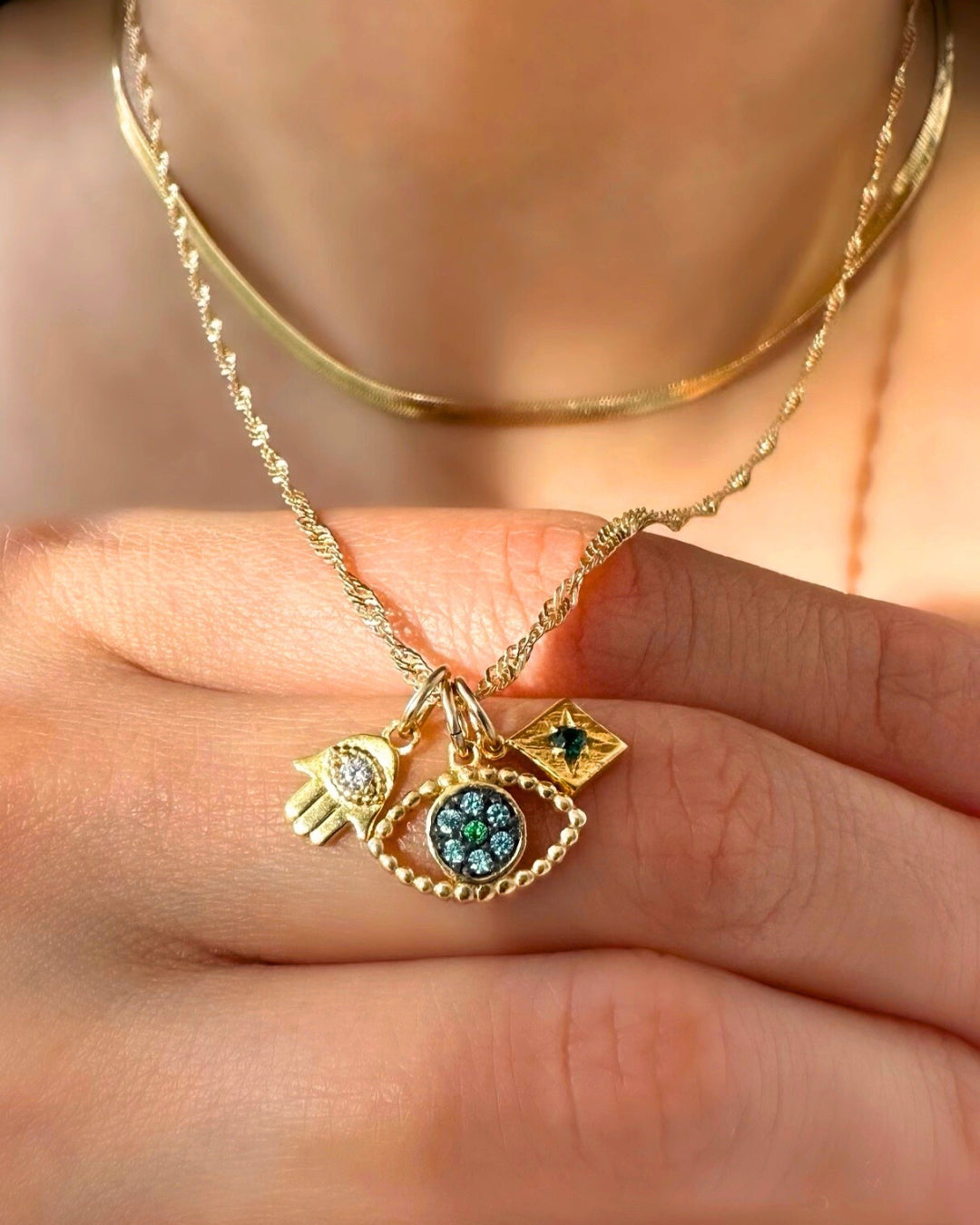14k gold fill evil eye protection talisman necklace pendant charm on a gold singapore chain necklace
