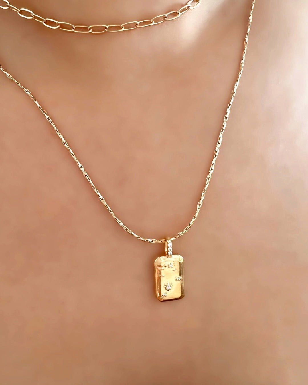 Gold Aquarius Constellation Zodiac Pendant with Gold Necklace Chain on a model