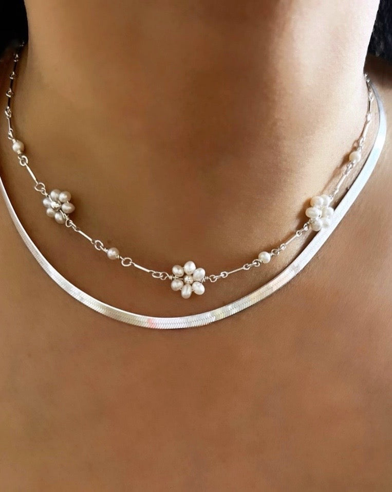 Sterling silver serpentine herringbone necklace chain on a model