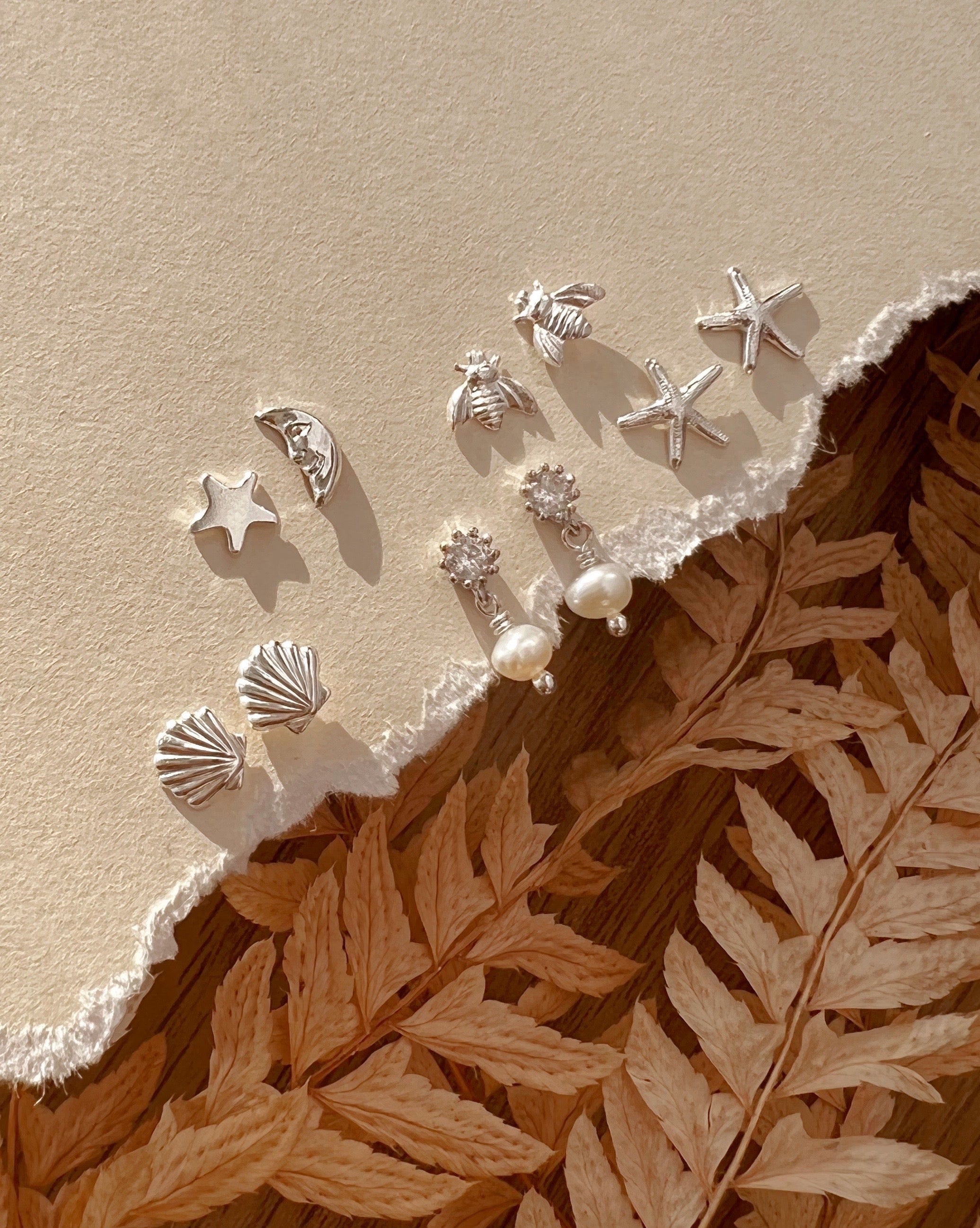 Sterling silver starfish stud post earrings with butterfly backs