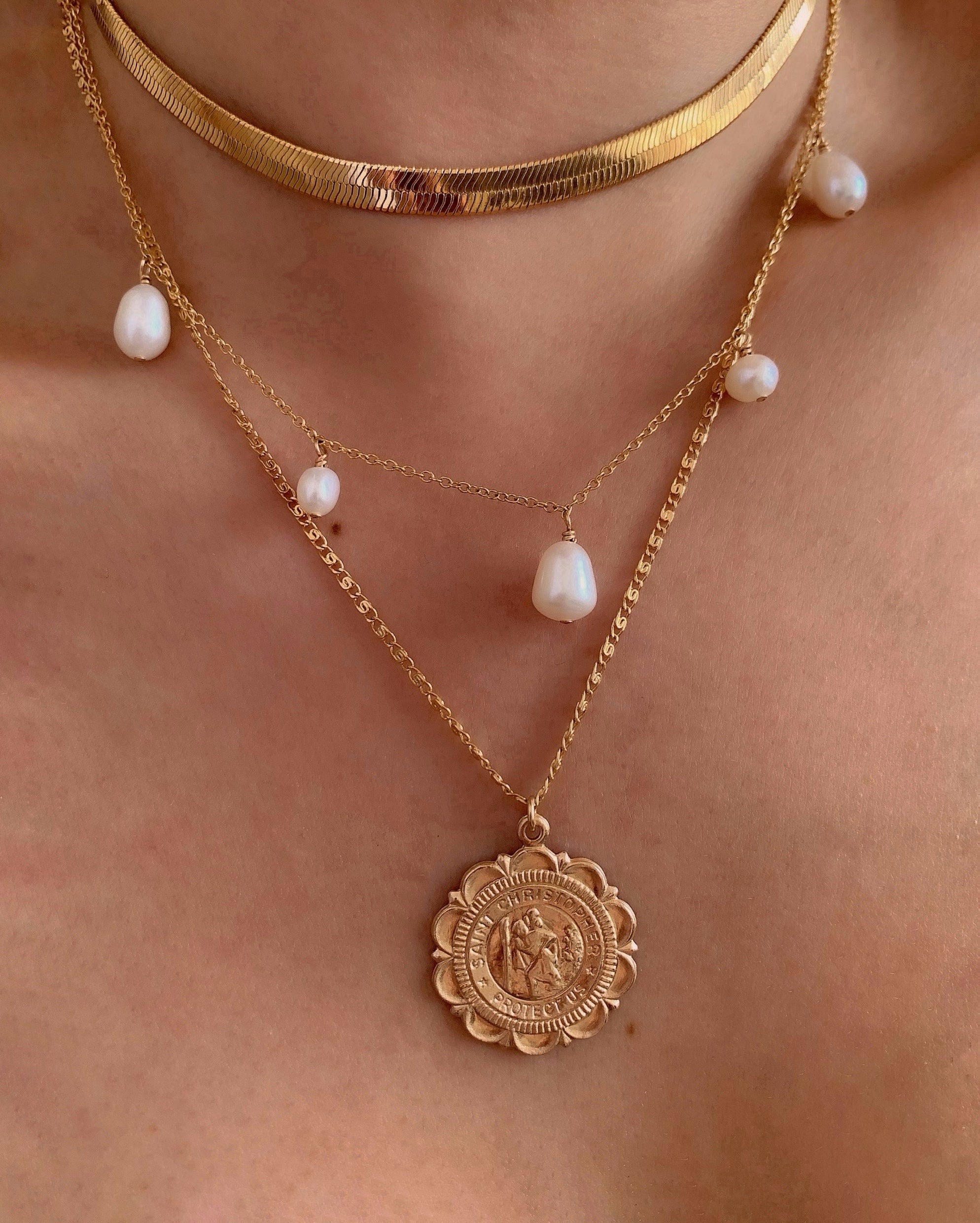 Moonbeam pearl necklace with 5 baroque freshwater pearls on a 14k gold fill chain, designed and handmade in Australia. Unique baroque pearl necklace for timeless style.