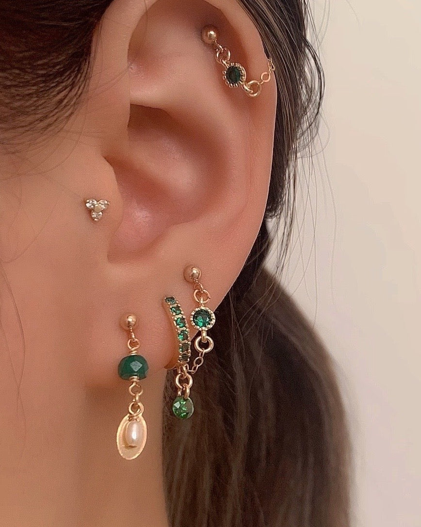14k gold fill freshwater pearl chain stud earring on a model