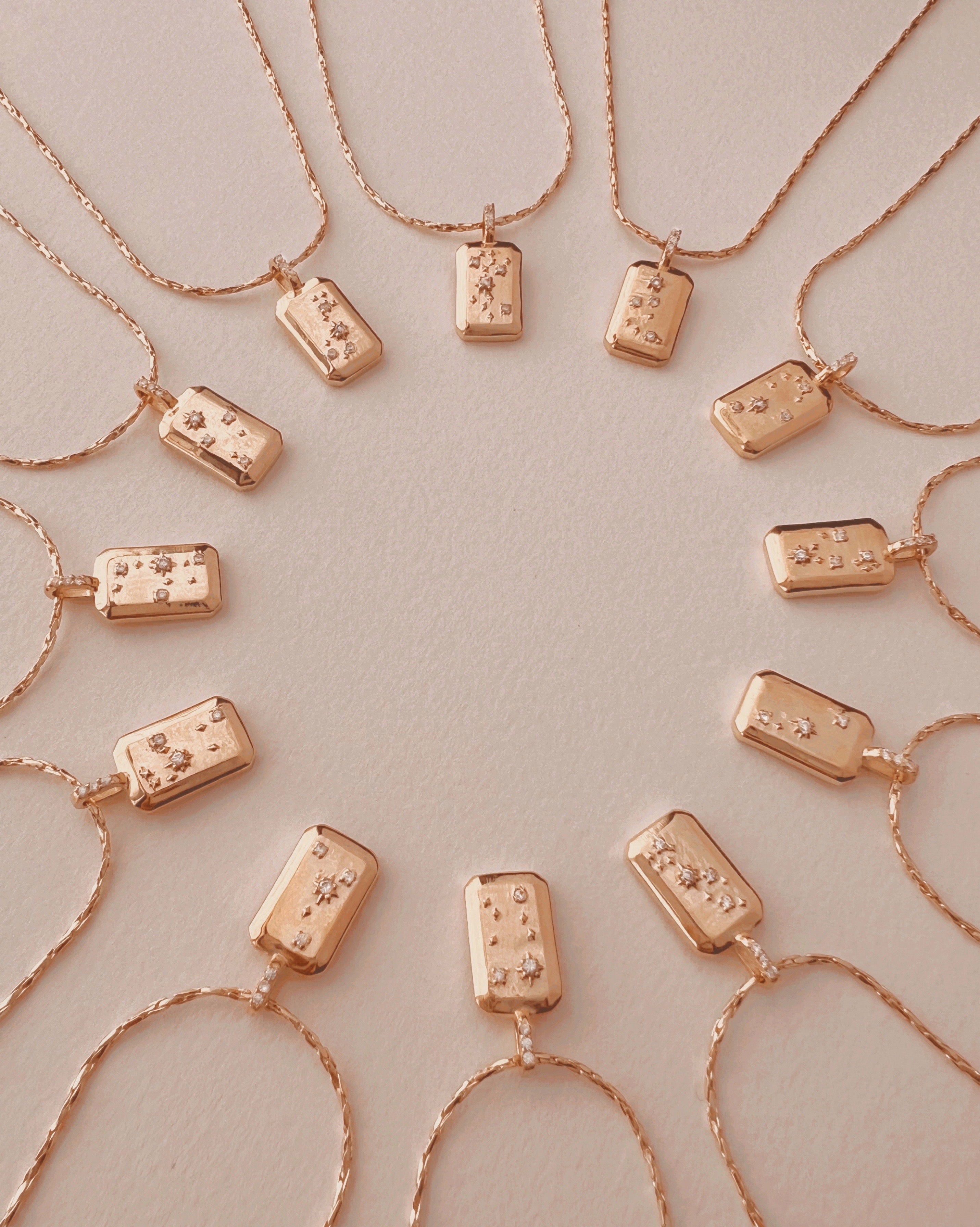 Gold Sagittarius Constellation Zodiac Pendant on a Gold Necklace Chain