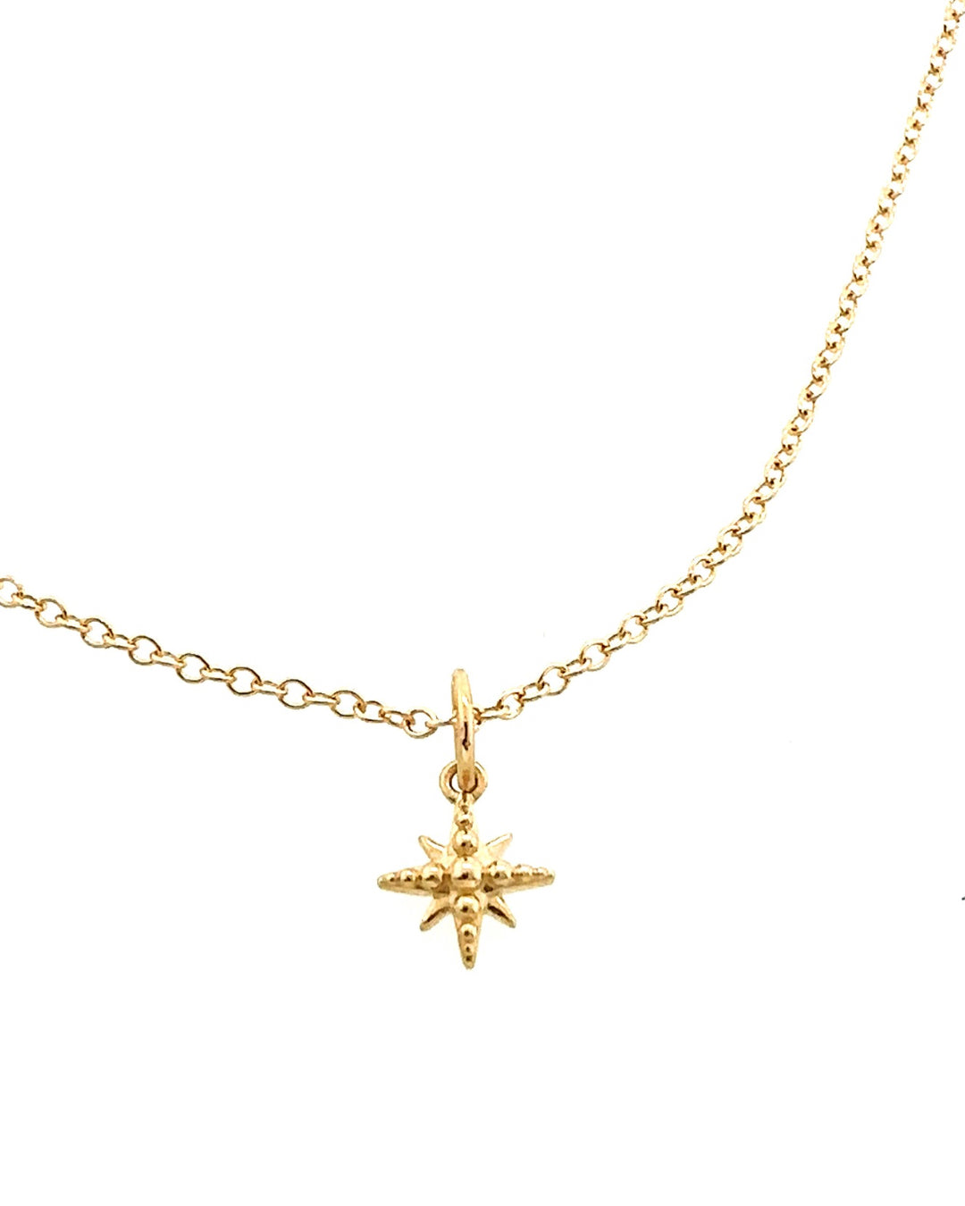 14k yellow solis gold North Star pendant charm on a 14k solid gold necklace chain 