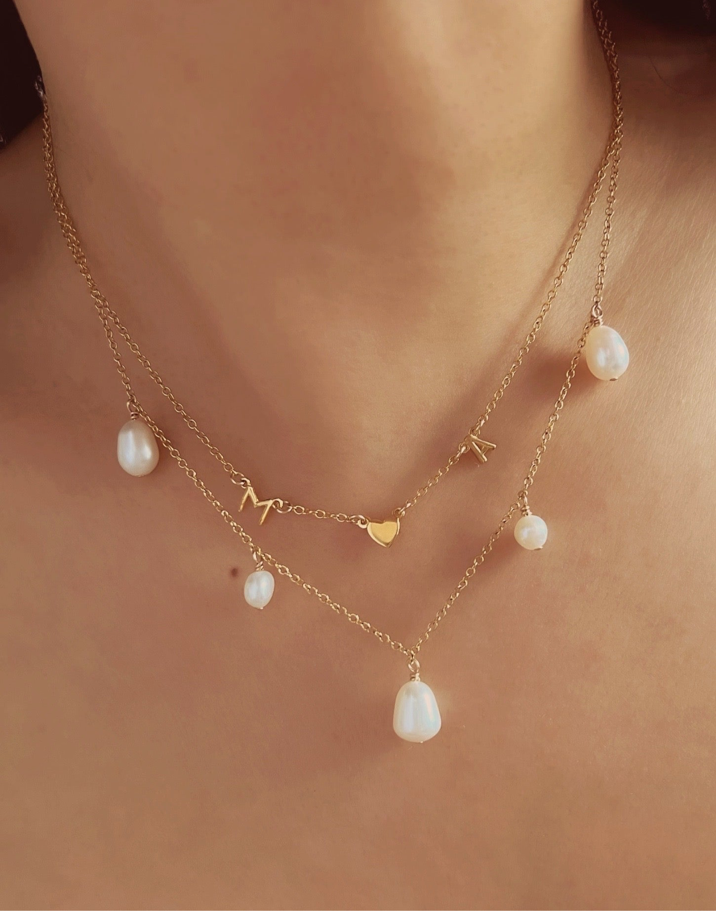 Moonbeam pearl necklace with 5 baroque freshwater pearls on a 14k gold fill chain, designed and handmade in Australia. Unique baroque pearl necklace for timeless style.