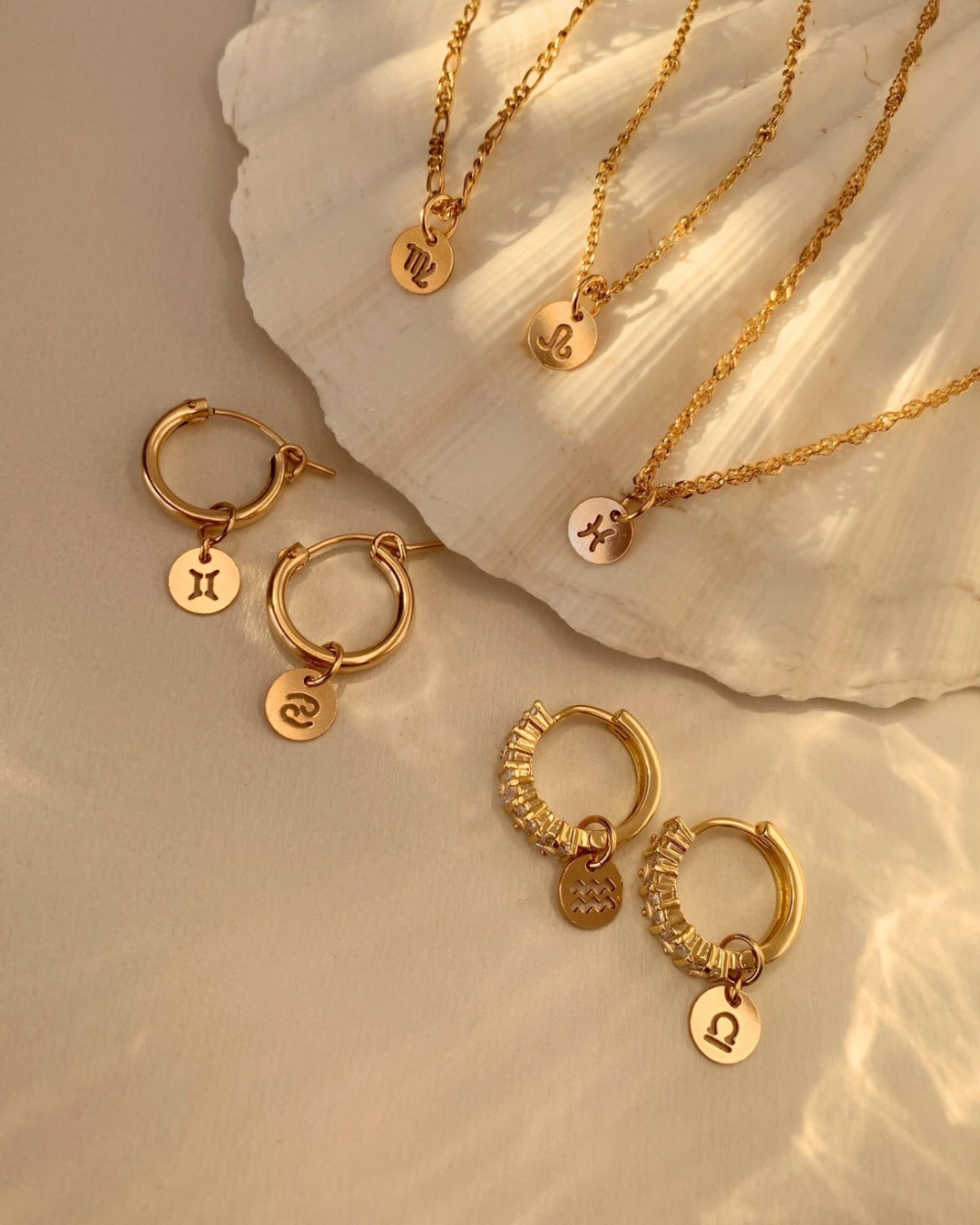 14k yellow gold fill mini zodiac earring charms for huggie hoops earrings. Made in Australia. 