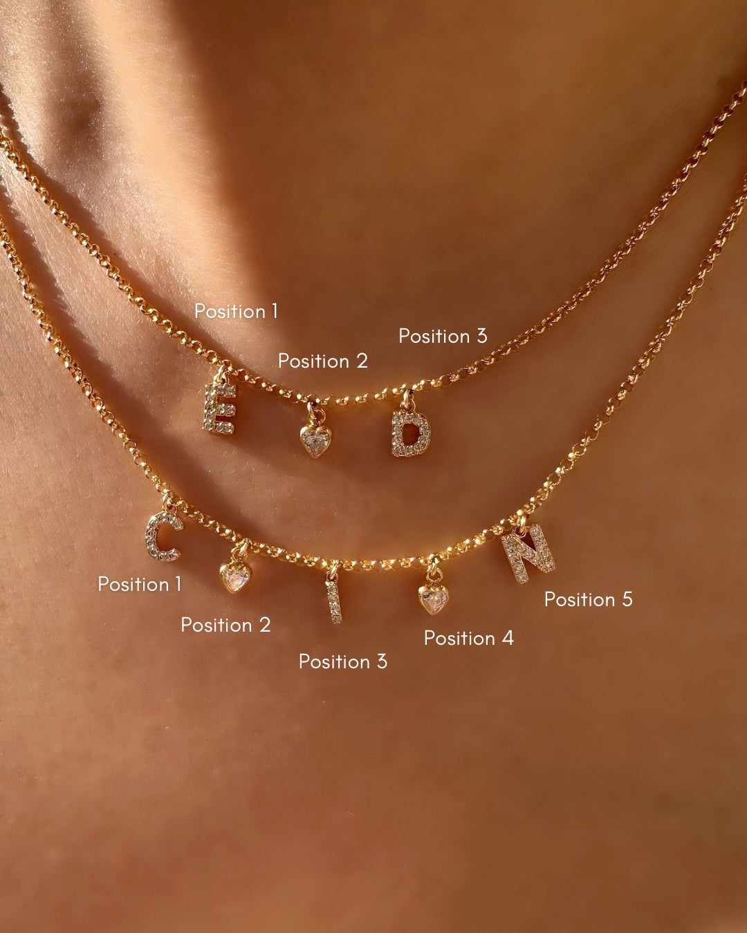 See how it looks: Top necklace shows 3 charms (E ♡ D), bottom shows 5 charms (C ♡ I ♡ N)