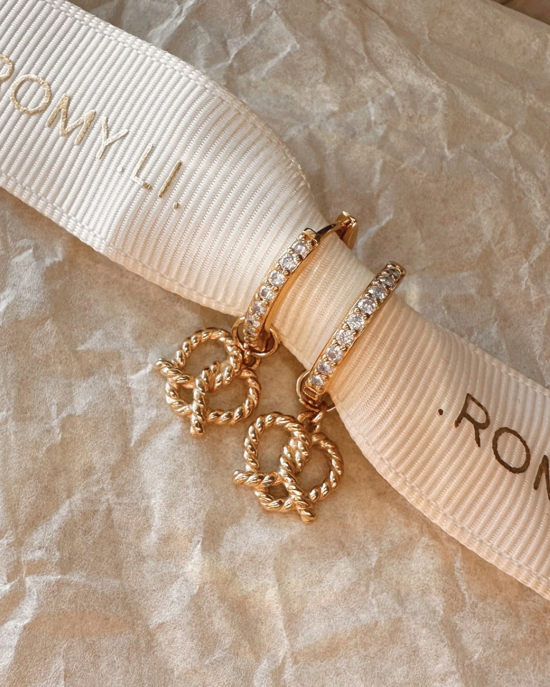 14k gold fill pretzel love heart Huggie earring charms for hoops Australia. Paired with Classic Pave Huggie Hoops 