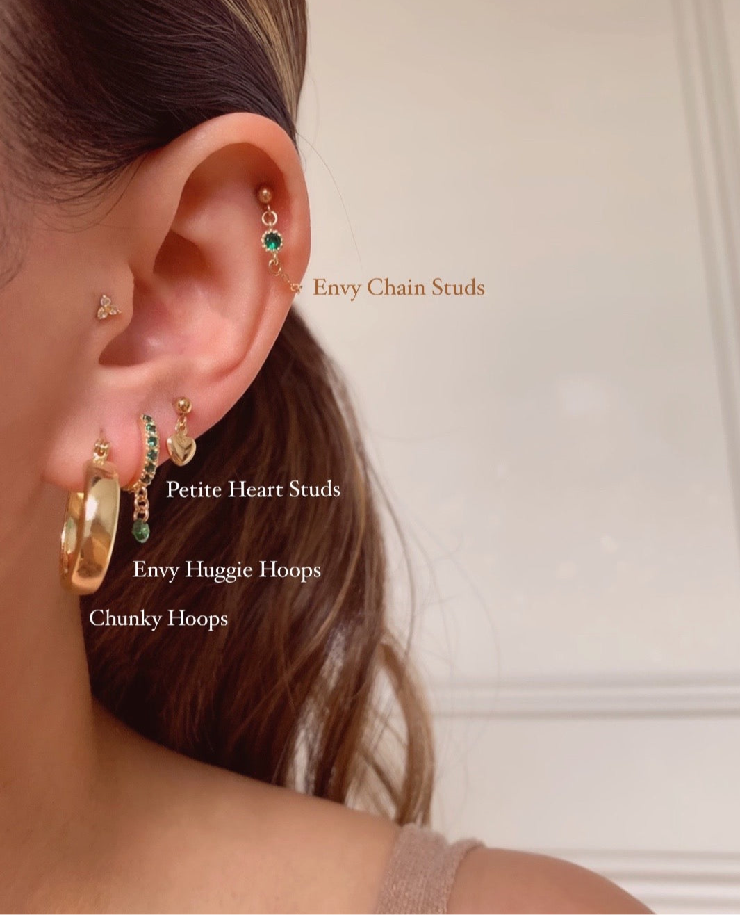 Gold fill thick bold chunky hoops earrings on a model