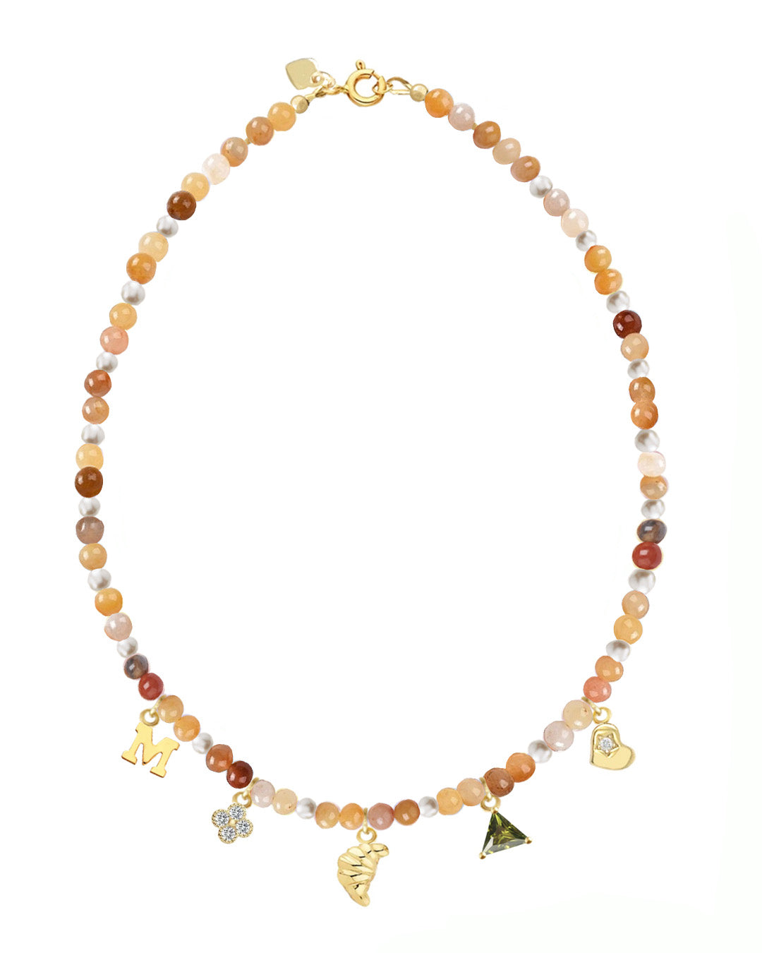 Necklace with golden jade beads and gold charms on a white background