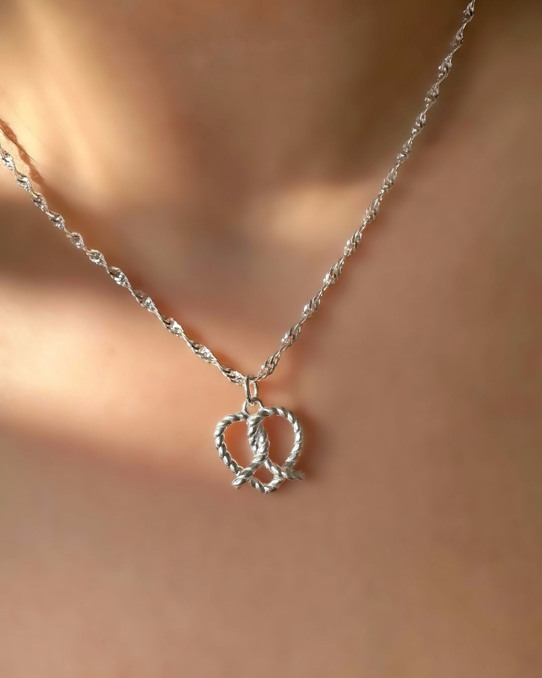 Sterling silver paperclip chain necklace. Made in Australia. For sensitive skin, tarnish resistant, waterproof jewelry. Paired with pretzel heart pendant. 