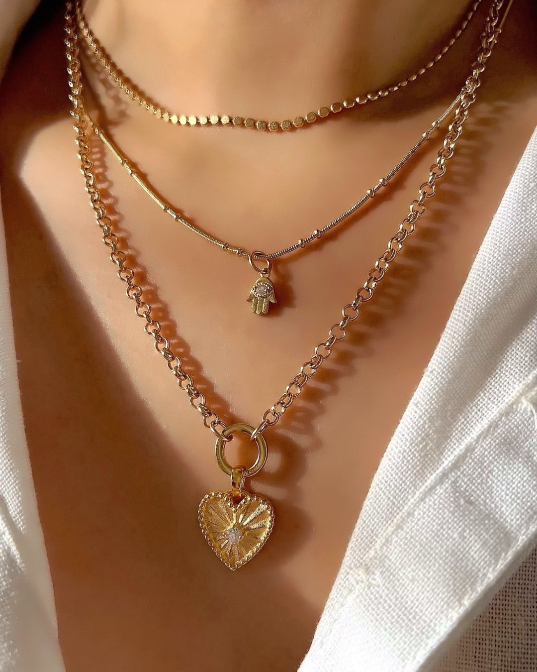 14k Gold fill Rolo annex link clasp necklace with heart token pendant on a model 