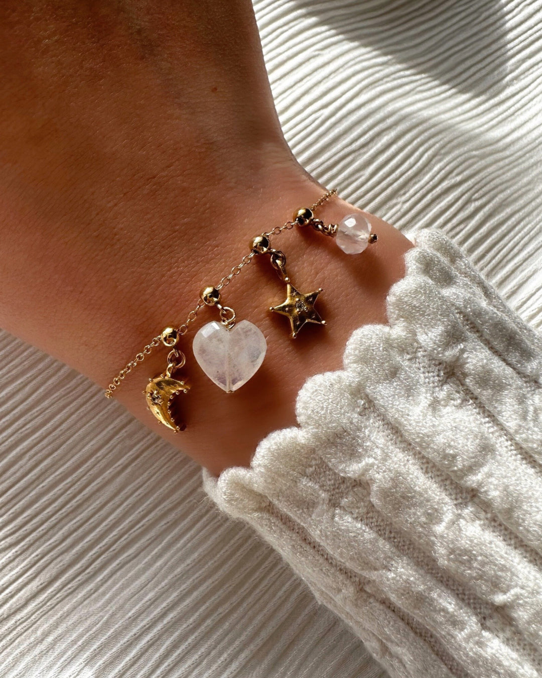 Semi-precious Moonstone Heart Gem Charm with 14k gold fill finish on Charm Story Bracelet.