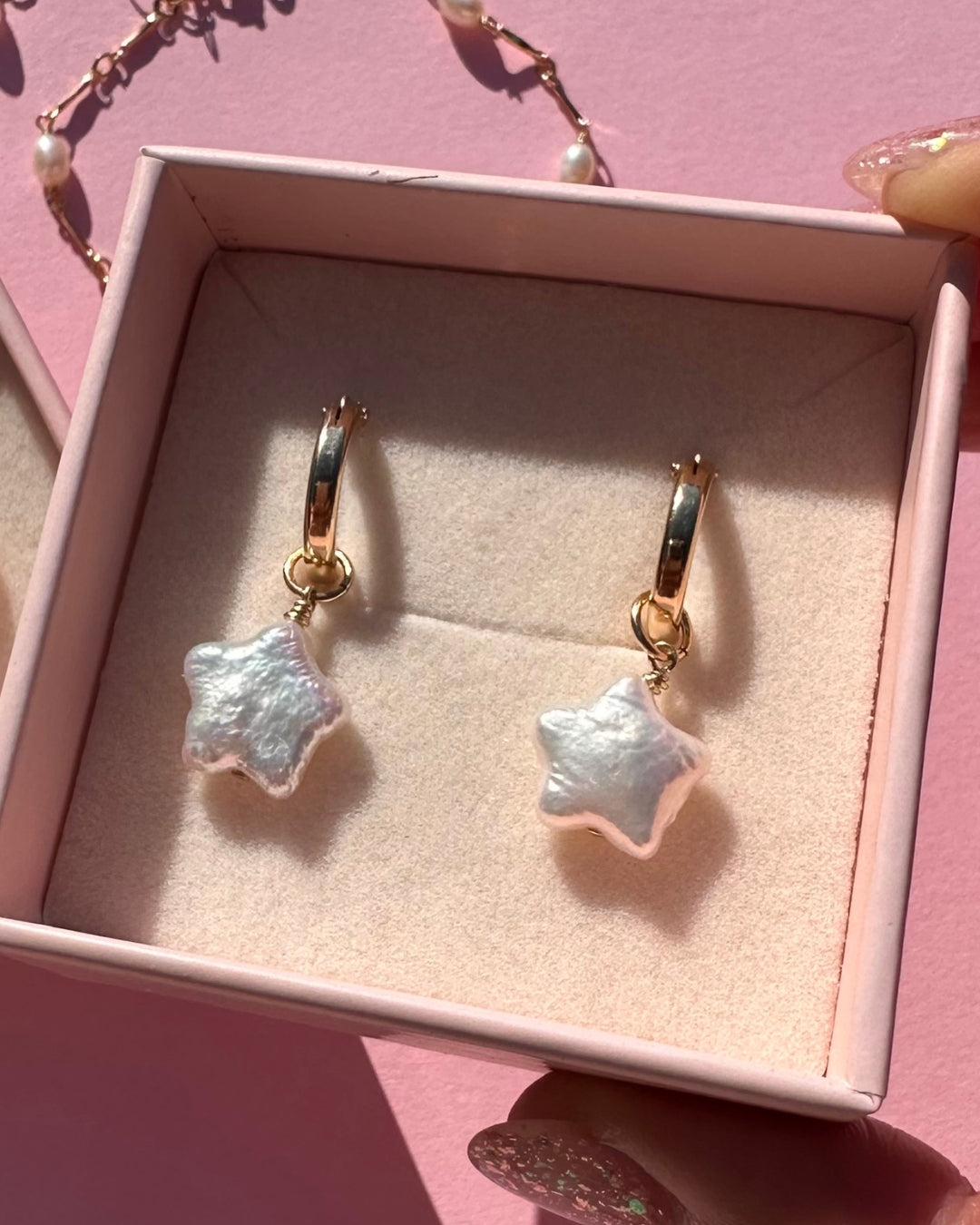 Gold Star Pearl Hoops in our signature Romyli gift box, ready for gifting. 
