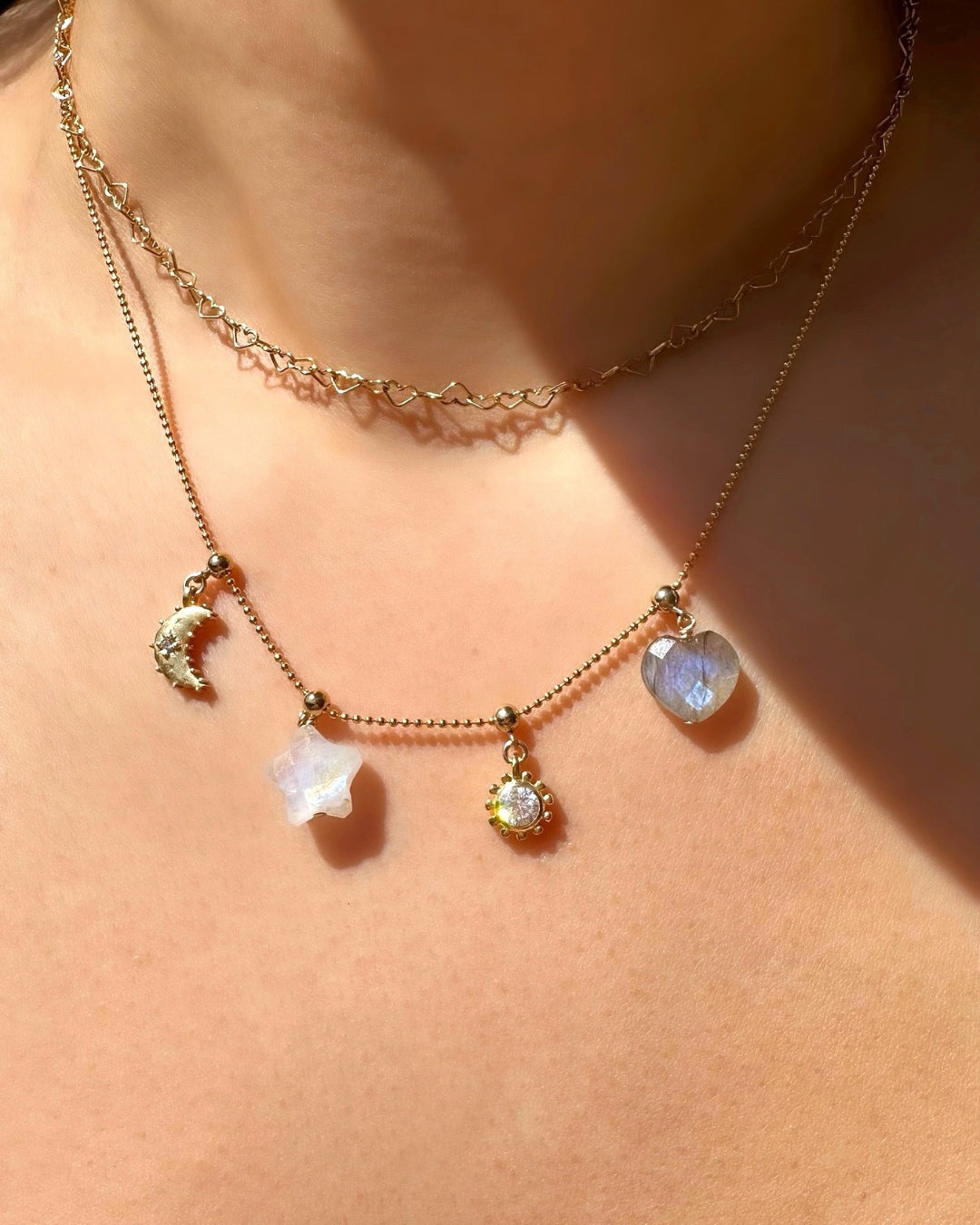 Model wearing 14k gold fill Moonstone Star Charm on the Charm Story Bead Necklace 