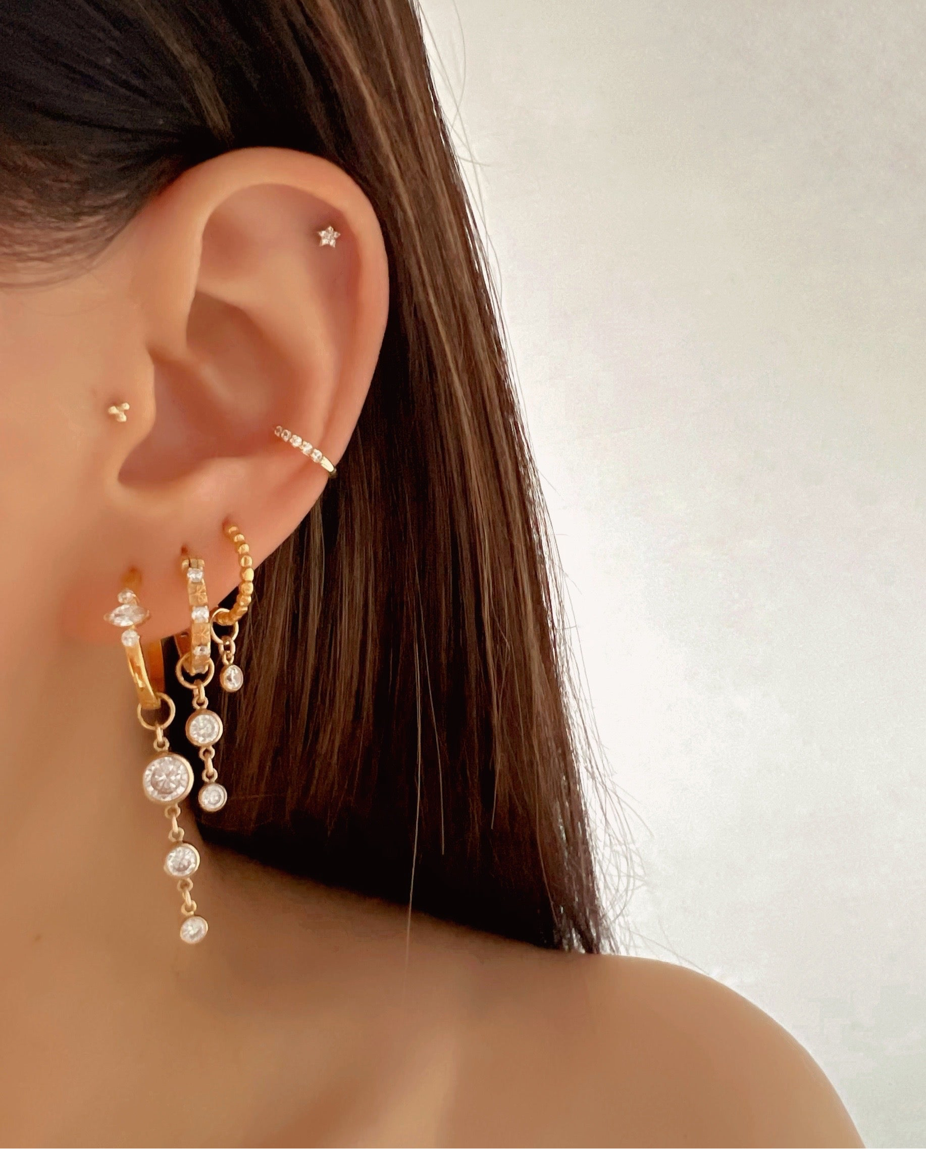 Gold Classic Pave Ear Cuff on a model 