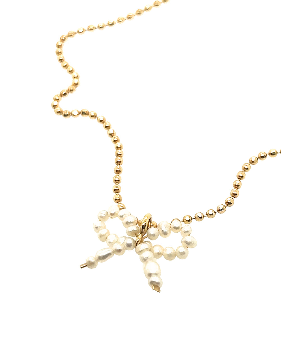 Freshwater Pearl Bow Pendant on a gold satellite chain necklace 