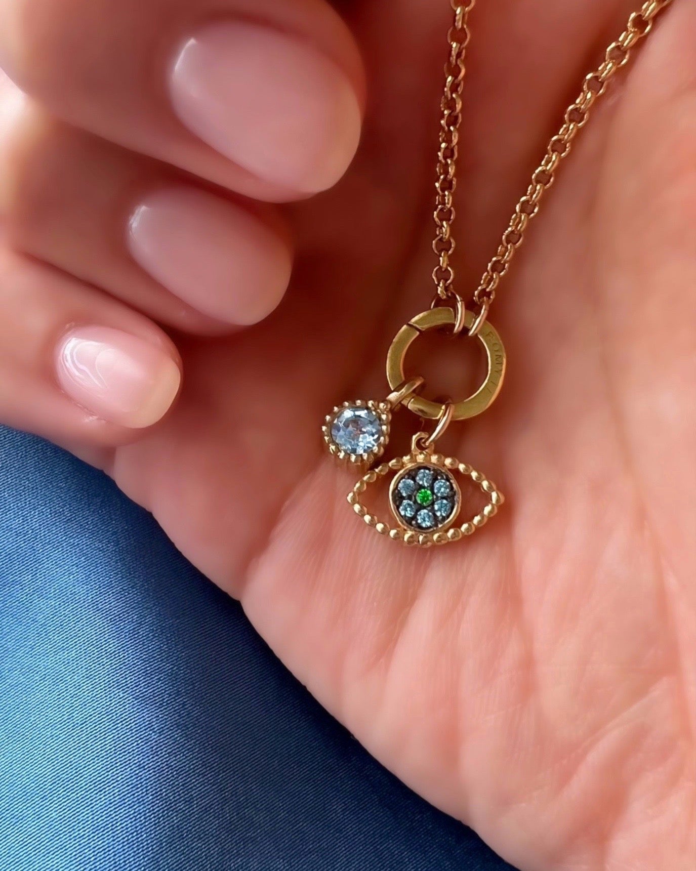 Gold Birthstone Pendants paired with Evil Eye Pendant and Gold Annex Link Necklace Chain. January Garnet February Amethyst March Aquamarine April Diamond May Emerald June Alexandrite July Ruby August Peridot September Sapphire October Tourmaline November Citrine December Topaz